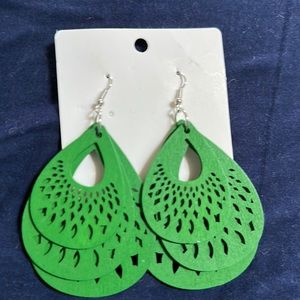 Green dangling earrings